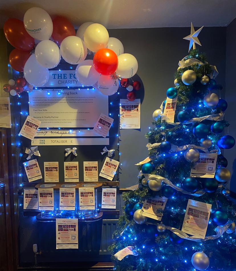 A Christmas tree with RSF posters - Stonehouse Pizza