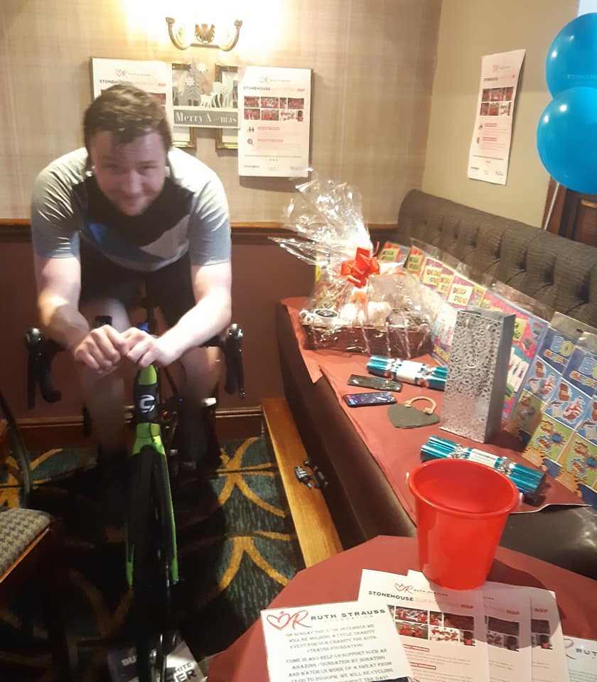 A man cycling to raise money- stonehouse pizza