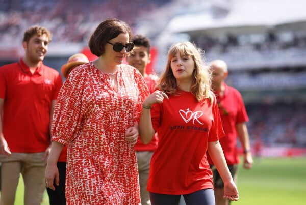 Nina with her daughter during the Red for Ruth Day 2024 event, supporting the Foundation’s mission.